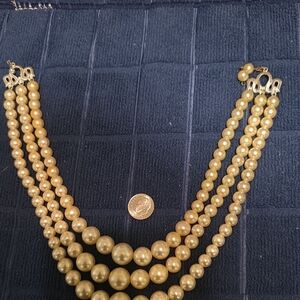 Elegant Triple Strand Gold Pearl Necklace